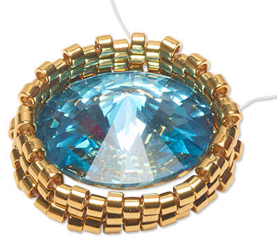 Rivoli set into partially finished bezel